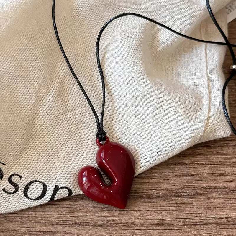 Vintage Heart Necklace with glossy red heart pendant on choker chain