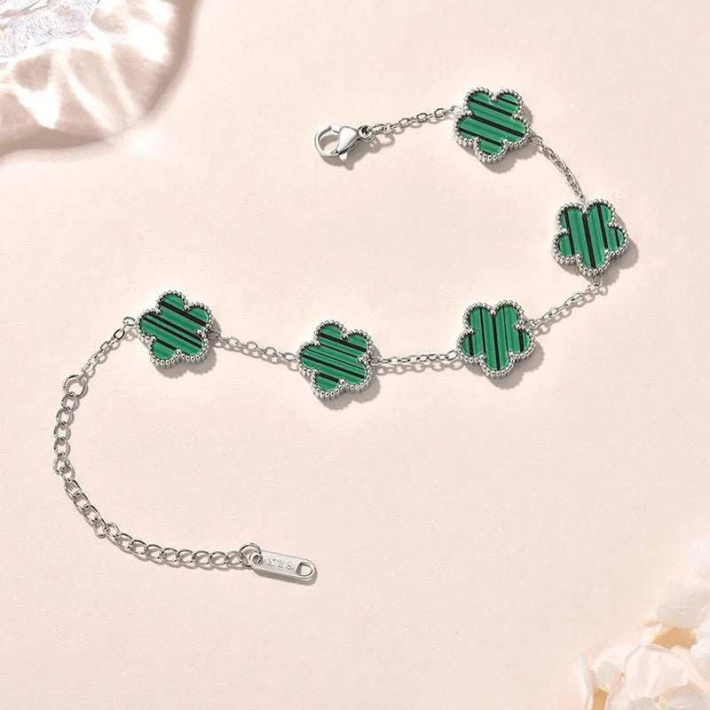 Elegant gold plated Lucky Clover Flower Bracelet with double-sided floral charms for women